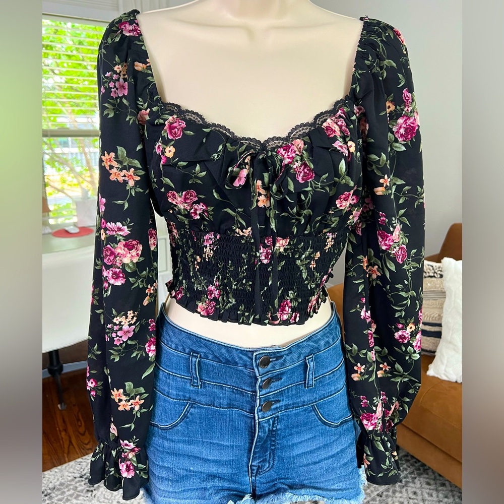 Forever 21 size medium black crop top with floral design and lace detailing